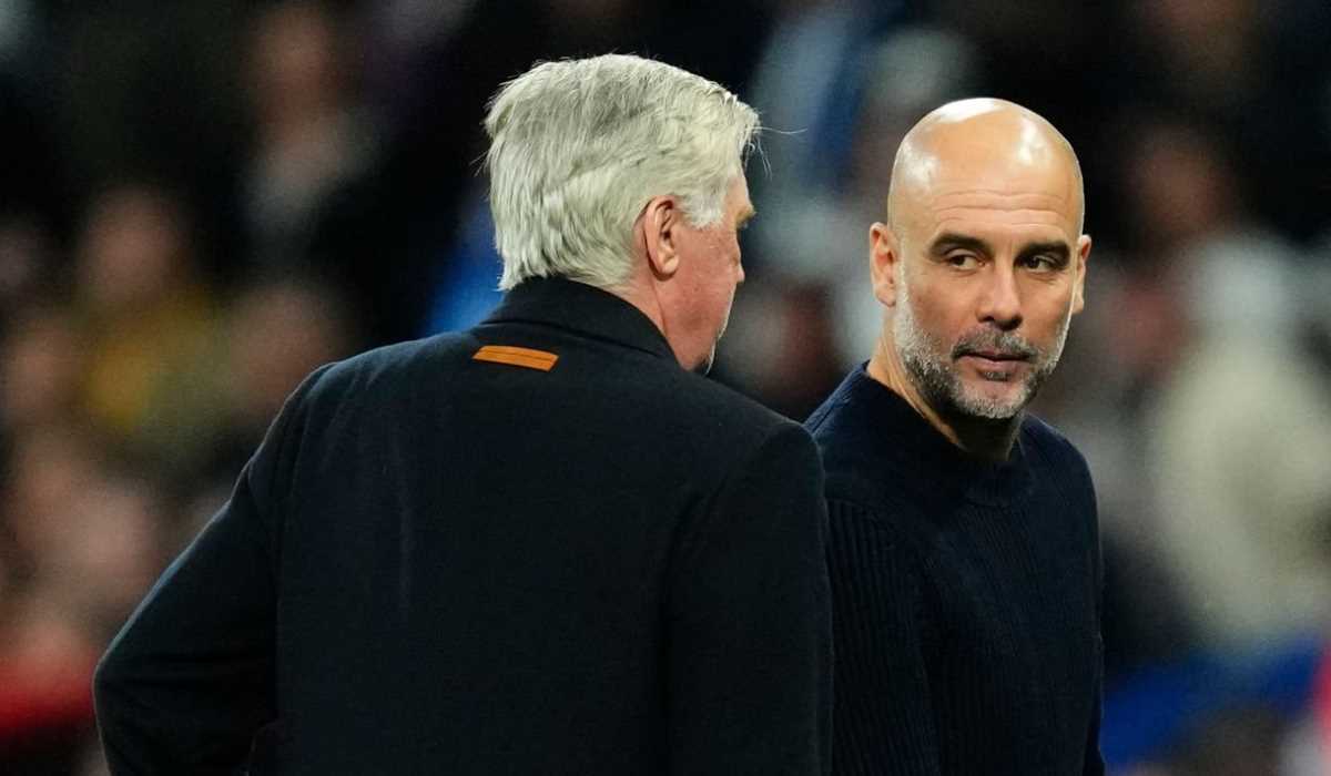 Pep Guardiola berbicara dengan Carlo Ancelotti usai laga Real Madrid vs Manchester City